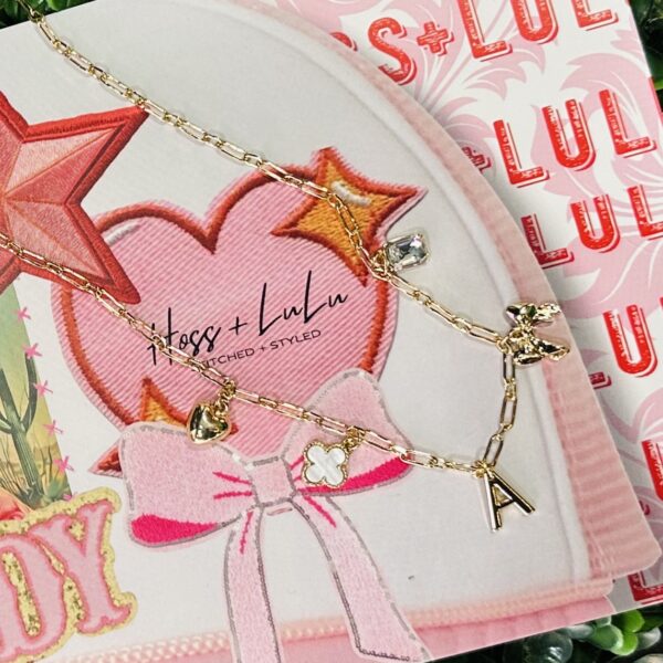 A Gold Charm Necklace 16"-18"